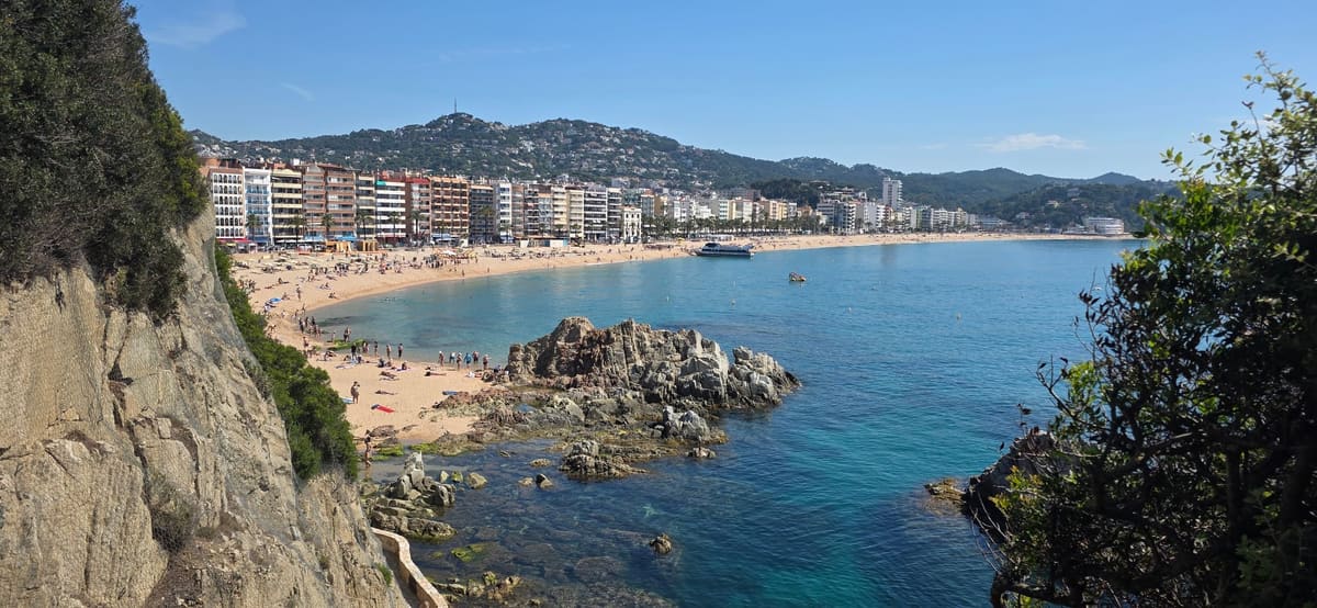 The bay at Lloret de Mar seen from the coastal path, with the town and beach below