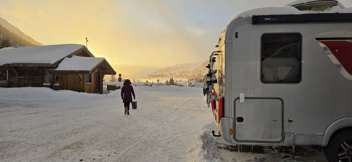The motorhome parked up at sunset on a winter evening